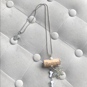 Wine cork ice skate necklace